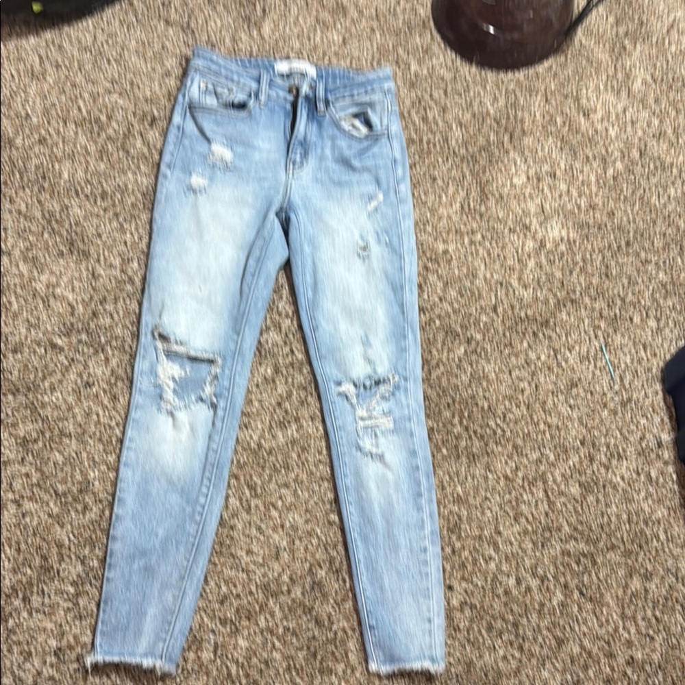 Women's Light Blue Distressed Jeans
